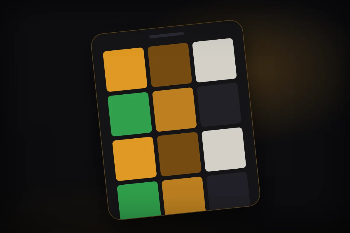 A phone on a dark desk, its screen showing a grid of ad thumbnails