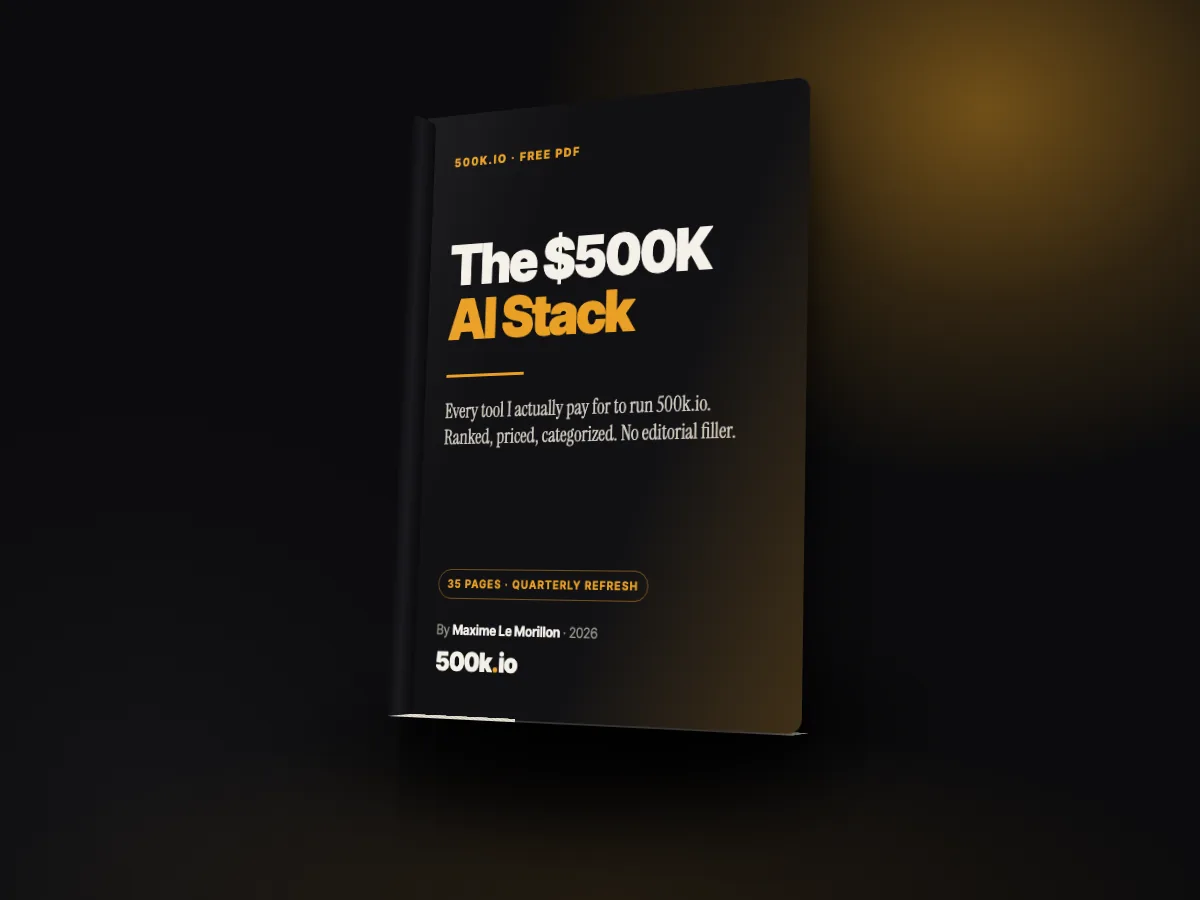The $500K AI Stack PDF, shown as a dark book cover with a gold title